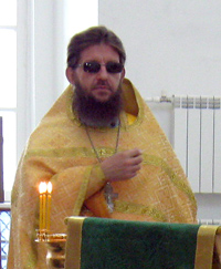 отец Адриан